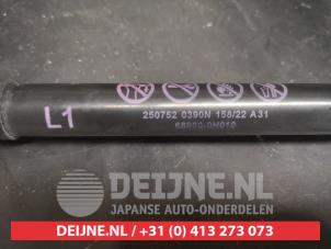 Toyota Aygo X Rear gas strut, left O736477 photo 3