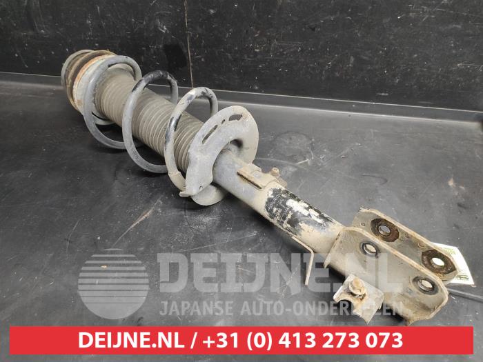 Suzuki Swift Schokdemperpoot links-voor O736604