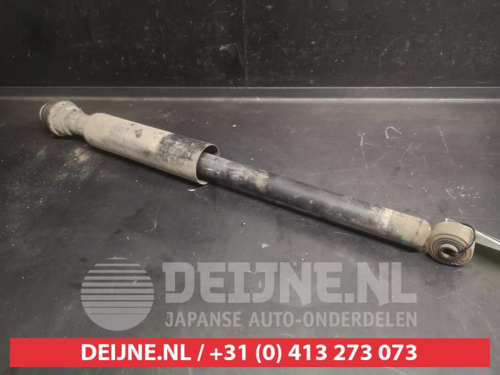 Daihatsu Cuore Rear shock absorber, left O736811