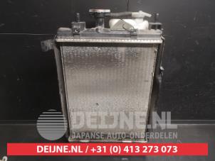 Radiateur van een Daihatsu Cuore (L251/271/276) 1.0 12V DVVT 2009