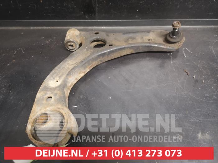 Daihatsu Cuore Front lower wishbone, right O736873