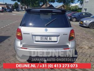 Suzuki SX-4 Stoßstange hinten O737168 foto 2