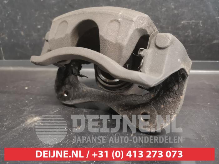 Kia Sportage Front brake calliper, left O737459