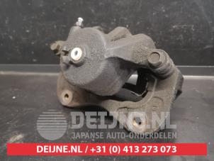 Kia Sportage Bremszange links vorne O737459 foto 2