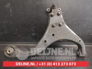 Kia Sportage Querlenker unten links vorne O737485 foto 2