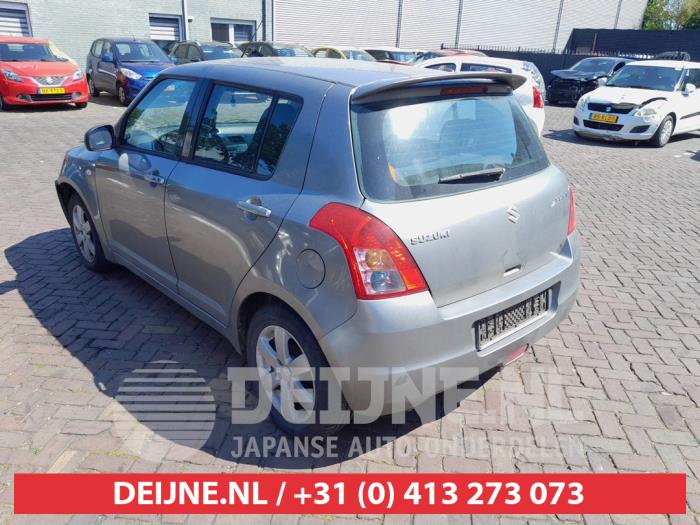 Suzuki Swift Stoßstange hinten O738204