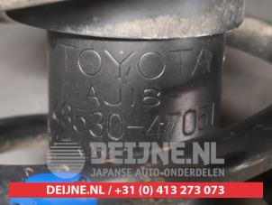 Toyota Prius Schokdemperpoot links-achter O738333 foto 2