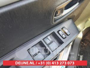 Toyota Yaris Multi-functional window switch O738550 photo 2