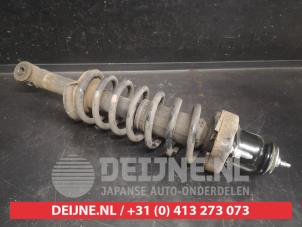Mitsubishi Outlander Schokdemperpoot links-achter O738679 foto 2