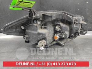 Suzuki SX-4 Koplamp links O740245 foto 2