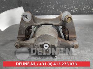 Hyundai Tucson Remklauw (Tang) links-voor O740503 foto 2
