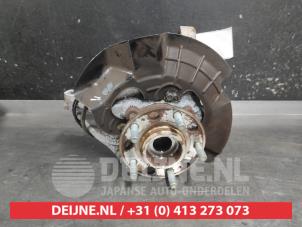 Hyundai Tucson Fusee links-voor O740504 foto 2