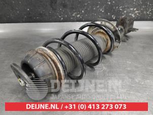 Suzuki Swift Front shock absorber rod, left O740589 photo 2