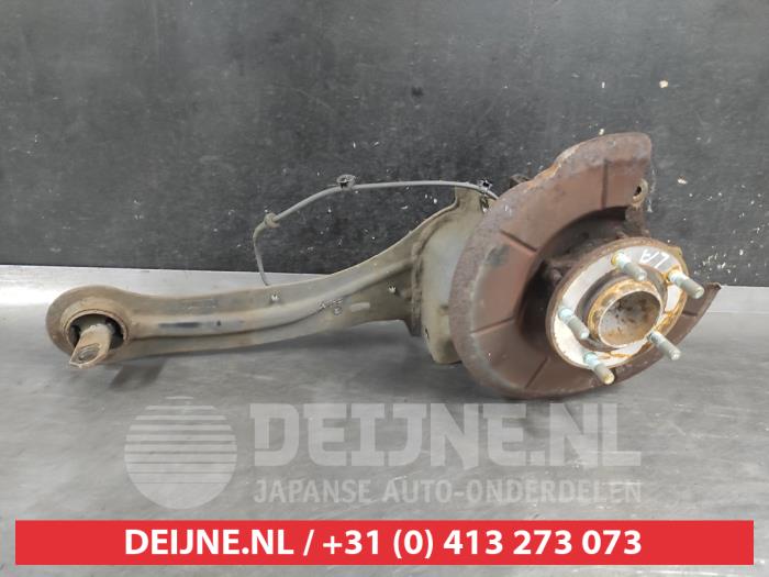 Mazda 3 Fusee links-achter O740681