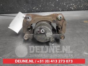 Toyota Prius Plus Bremszange links vorne O740937 foto 2