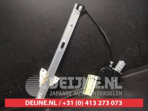 Mazda 2 Fenstermechanik 4-türig links vorne O741058 foto 2