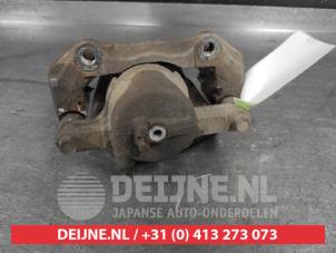 Suzuki Grand Vitara Bremszange links vorne O741313 foto 2