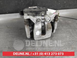 Nissan Qashqai Bremszange links hinten O741352 foto 3