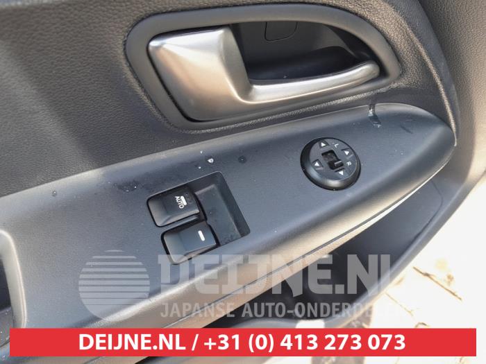 Kia Rio Multi-functional window switch O741563
