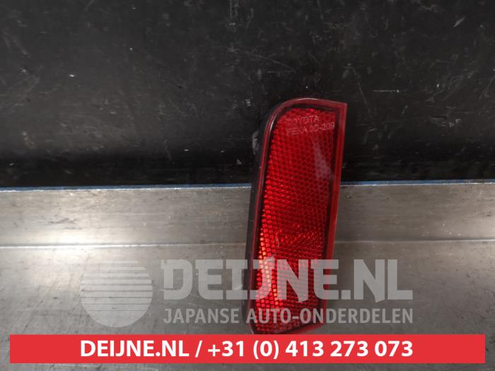 Toyota Yaris Rear bumper reflector, left O741799