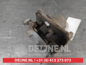 Nissan Murano Rear brake calliper, left O741860 photo 2