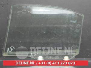 Mitsubishi Lancer Türscheibe 4-türig rechts hinten O742612 foto 2