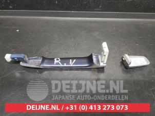 Mitsubishi Lancer Türgriff 4-türig rechts vorne O742635 foto 2