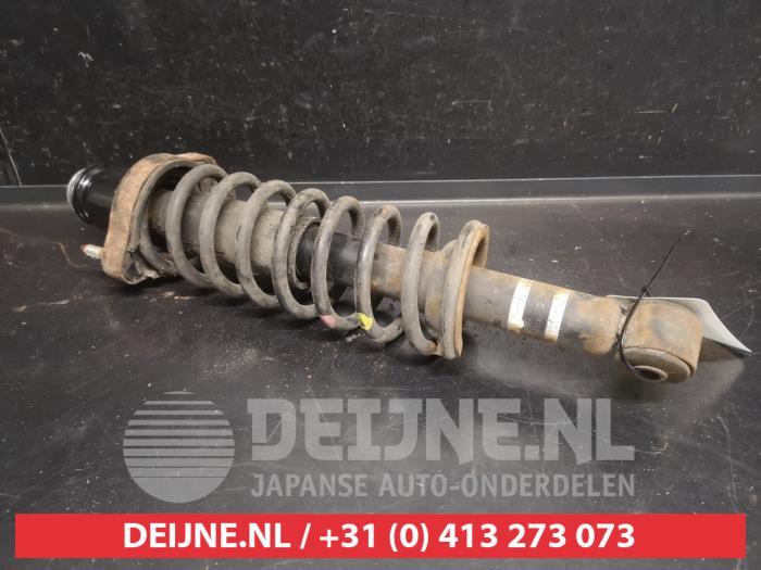 Mitsubishi Lancer Stoßdämpferstrebe links hinten O742700