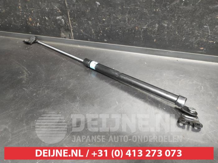Daihatsu Cuore Rear gas strut, left O742829
