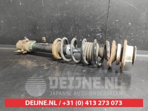 Daihatsu Cuore Stoßdämpferstrebe links vorne O742842 foto 2