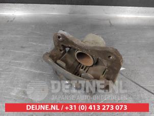 Hyundai Matrix Remklauw (Tang) links-voor O742943 foto 2