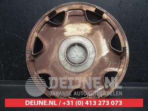 Mitsubishi Colt Wheel cover (spare) O743112 photo 3