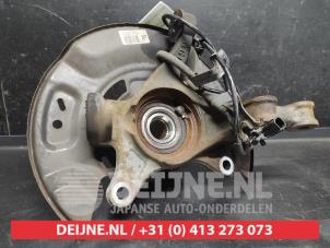 Toyota Yaris Achsschenkel links vorne O743306 foto 2