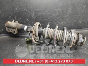 Toyota Yaris Stoßdämpferstrebe links vorne O743304 foto 2