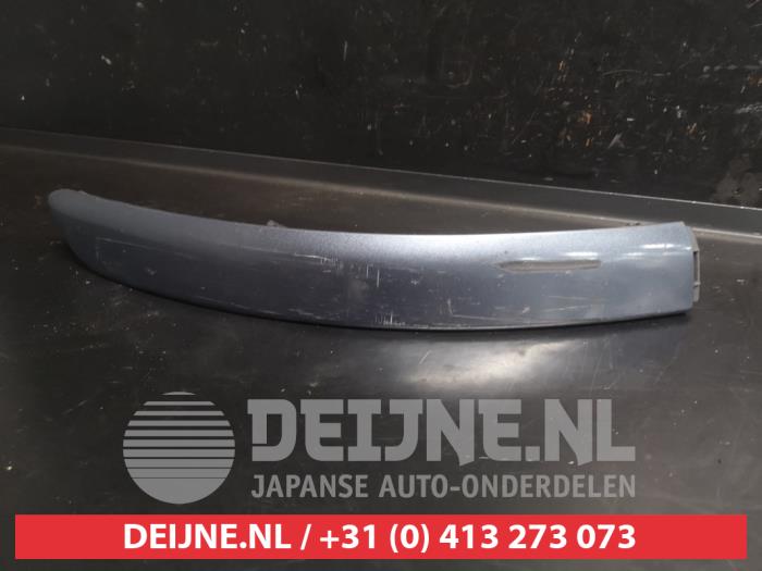 Toyota Yaris Front bumper strip, right O743522
