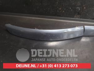 Toyota Yaris Bumperlijst rechts-voor O743522 foto 2