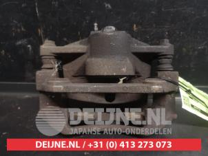 Toyota Yaris Bremszange links vorne O743596 foto 3
