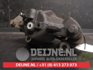 Toyota Yaris Bremszange links vorne O743596 foto 2