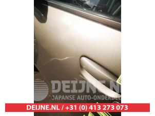 Mitsubishi Colt Portier 4Deurs links-voor O743781 foto 2