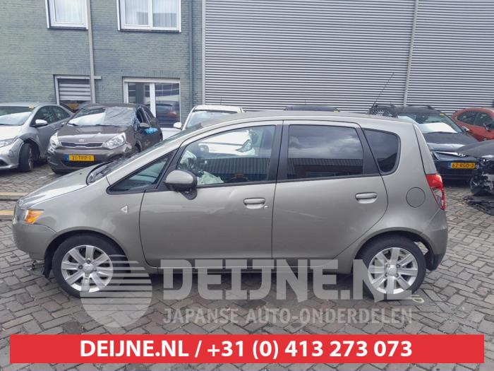 Mitsubishi Colt Türscheibe 4-türig links hinten O743786