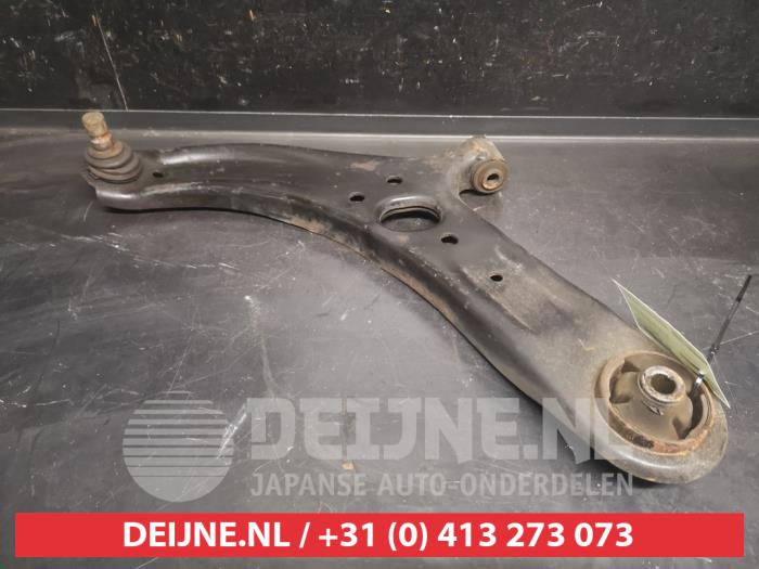 Kia Rio Front lower wishbone, left O744083
