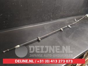 Toyota Yaris Handbremse Zug O744388 foto 3