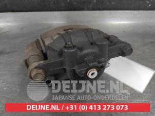 Mazda 2 Bremszange links vorne O744505 foto 3