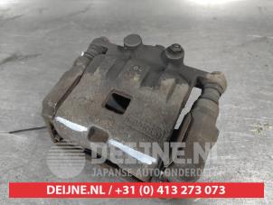 Mazda 2 Bremszange links vorne O744505 foto 2
