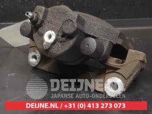 Toyota Yaris Front brake calliper, left O745175 photo 2