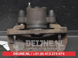 Toyota Yaris Front brake calliper, left O745175 photo 3