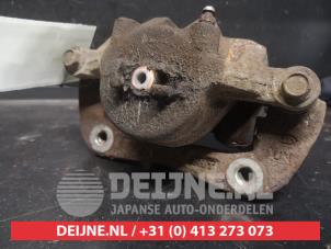 Kia Carens Remklauw (Tang) links-voor O746030 foto 2