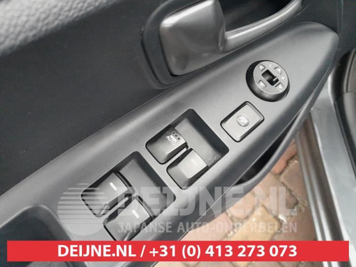 Kia Rio Multi-functional window switch O746315