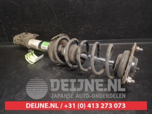 Mitsubishi Colt Stoßdämpferstrebe links vorne O746301 foto 2