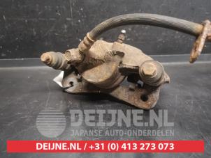 Toyota Starlet Bremszange rechts vorne O746672 foto 2